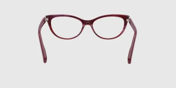 : "Tommy Hilfiger eyeglasses with stylish burgundy frames, offering a trendy and durable design perfect for everyday wear."